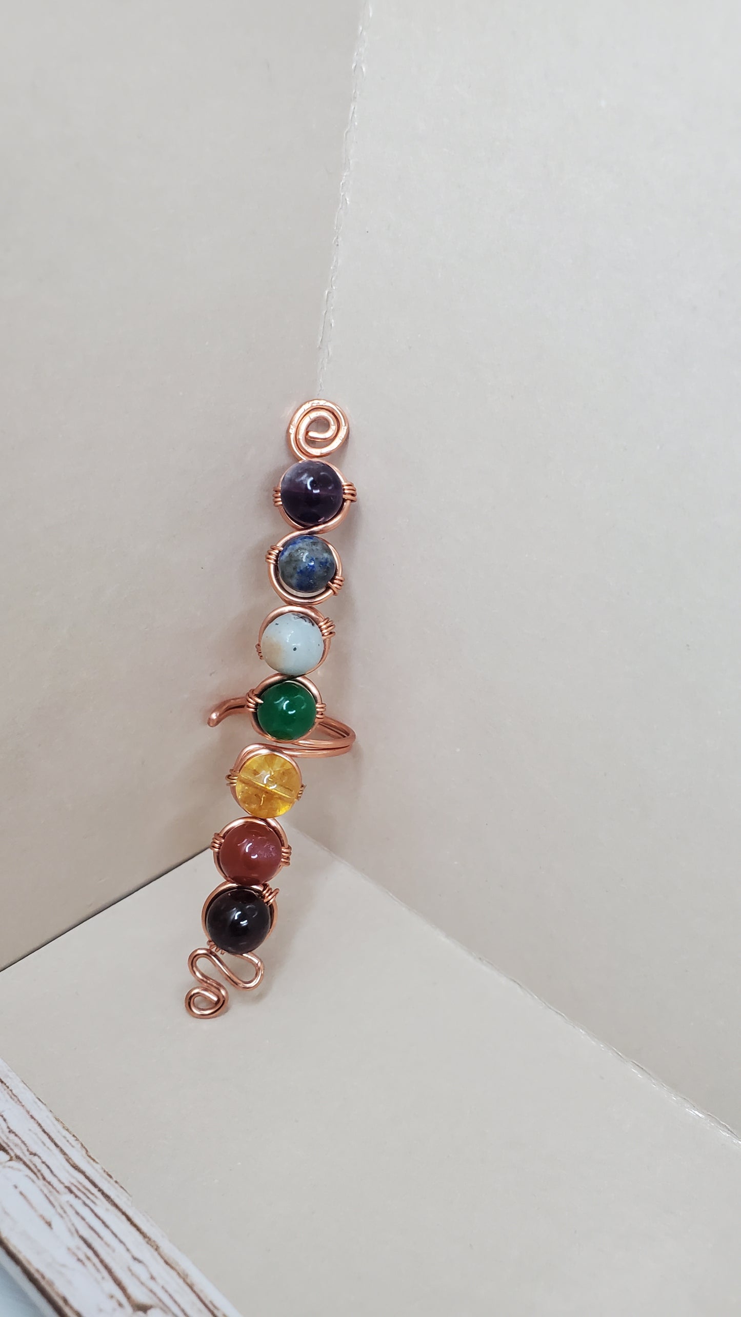 Experience inner harmony with our Adjustable Chakra Ring, featuring Amethyst, Lapis Lazuli, and more genuine crystals. Handcrafted with love, it's tarnish-free and hypoallergenic. Order now for balance and healing!