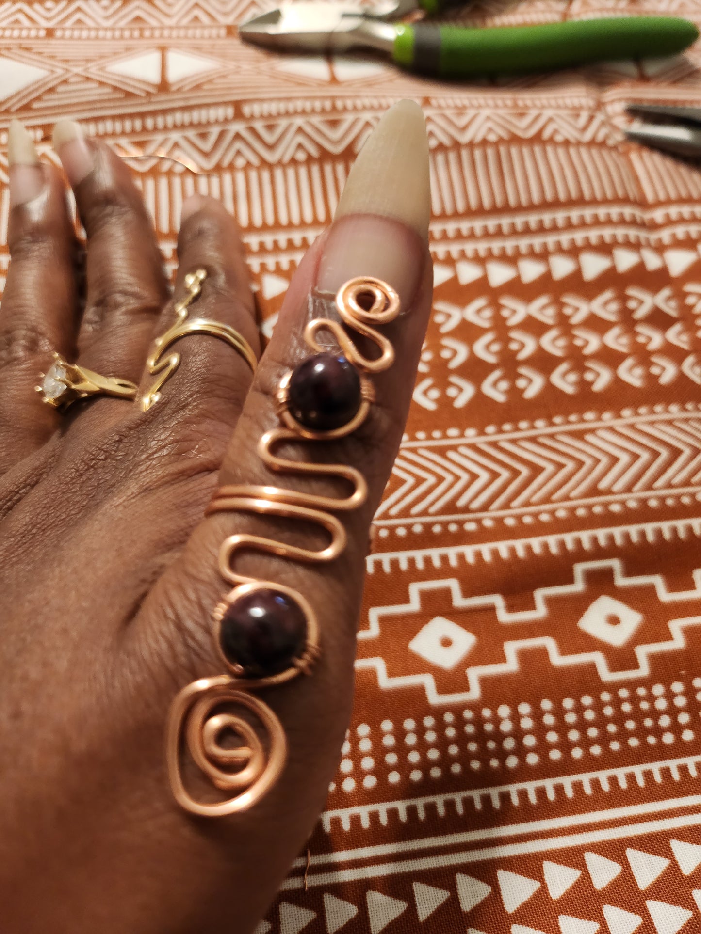 Elevate your well-being with our Adjustable Root Chakra Ring. Crafted with genuine Garnet Stones, this unique ring is a symbol of balance and strength. Shop now to reconnect with your roots and enhance your divine energy.