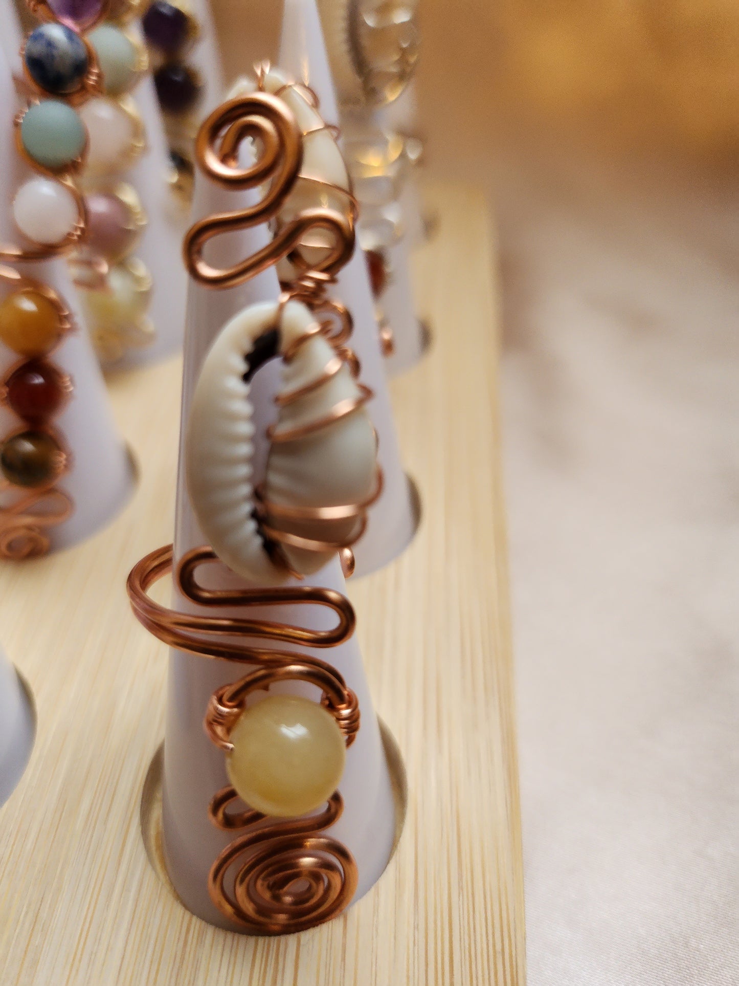 Crystal-Infused Cowrie Shell Ring, Healing Crystal Beads Jewelry, No Tarnish Copper Wire Ring, Adjustable Cowrie Shell Ring, Empowering Crystal Jewelry, Divine Energy Accessory, Unique Handmade Ring, Cowrie Shell Charm Crystal Beauty